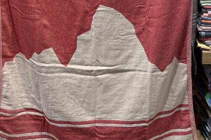 Jacquard-woven Turkish towel with Swiss cross and mountain motif, detail crop